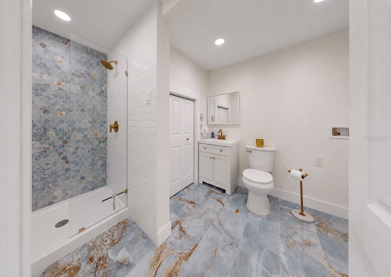 Full Bath 2 with Laundry Closet and Exterior Door for Convenience