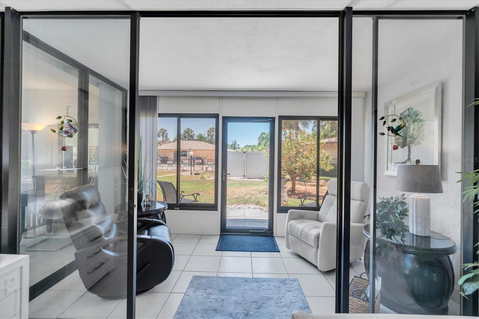 Florida Room - back door leads to patio and pool