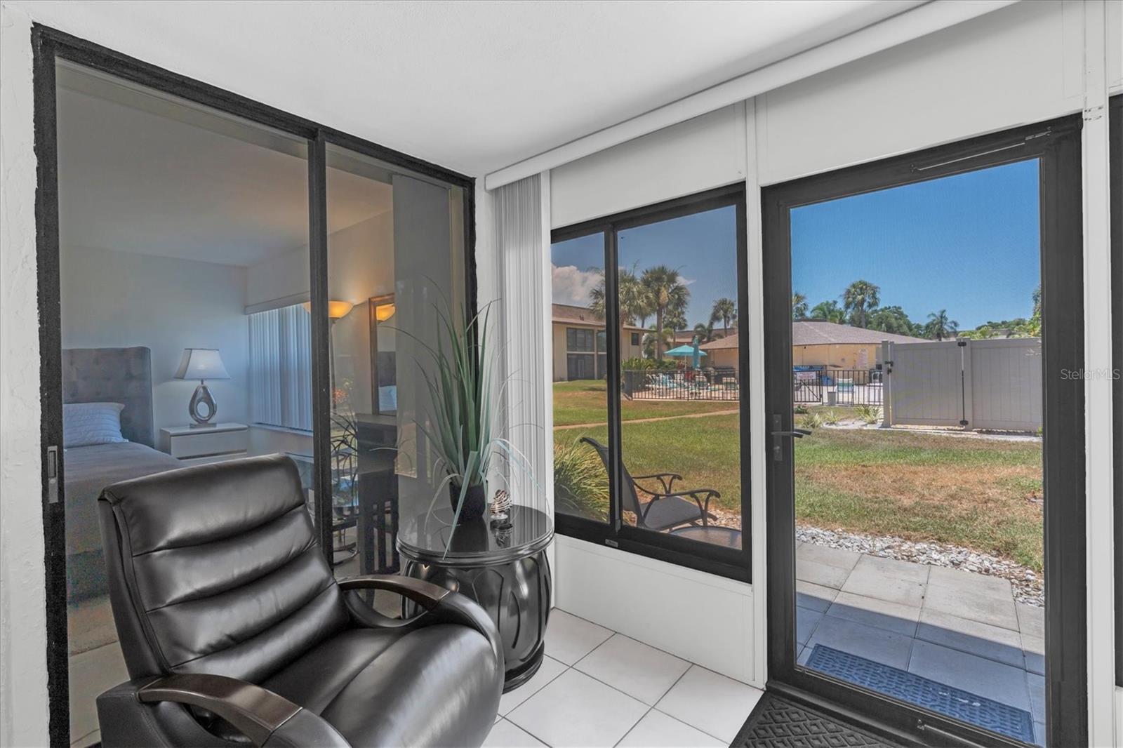 Florida Room - sliding glass door to Primary Bedroom