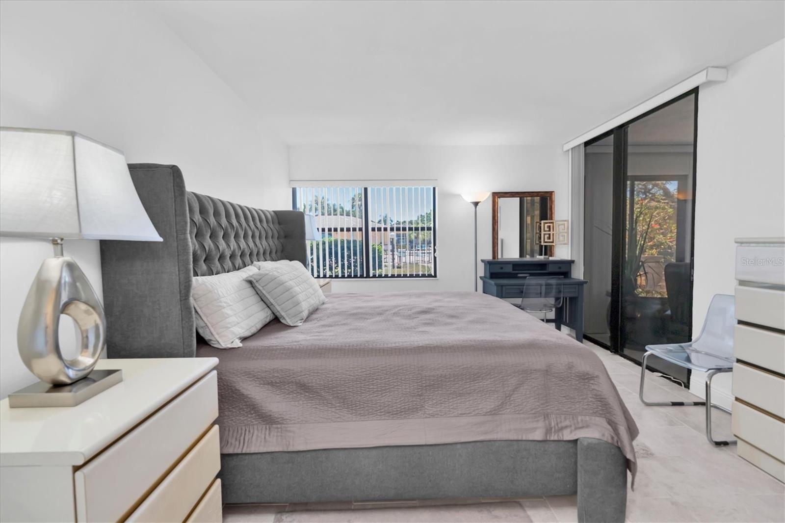 Primary Bedroom - patio door leads to Florida Room