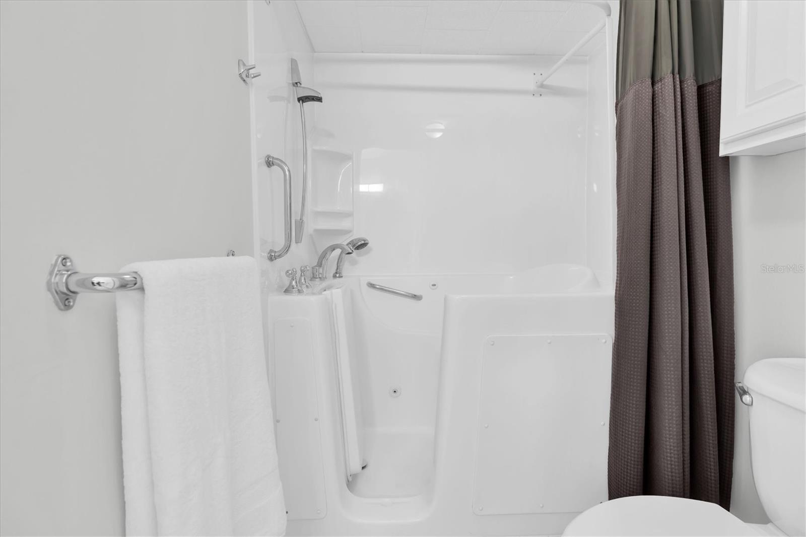 Primary Bathroom - Jacuzzi jetted walk in tub/shower
