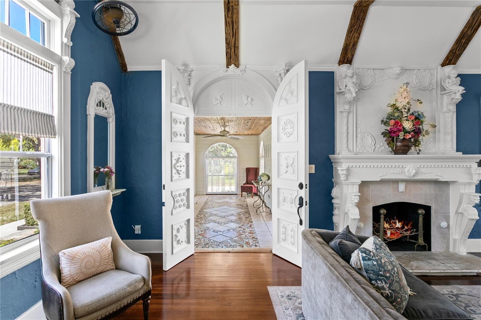 Elegant arched opening to living room