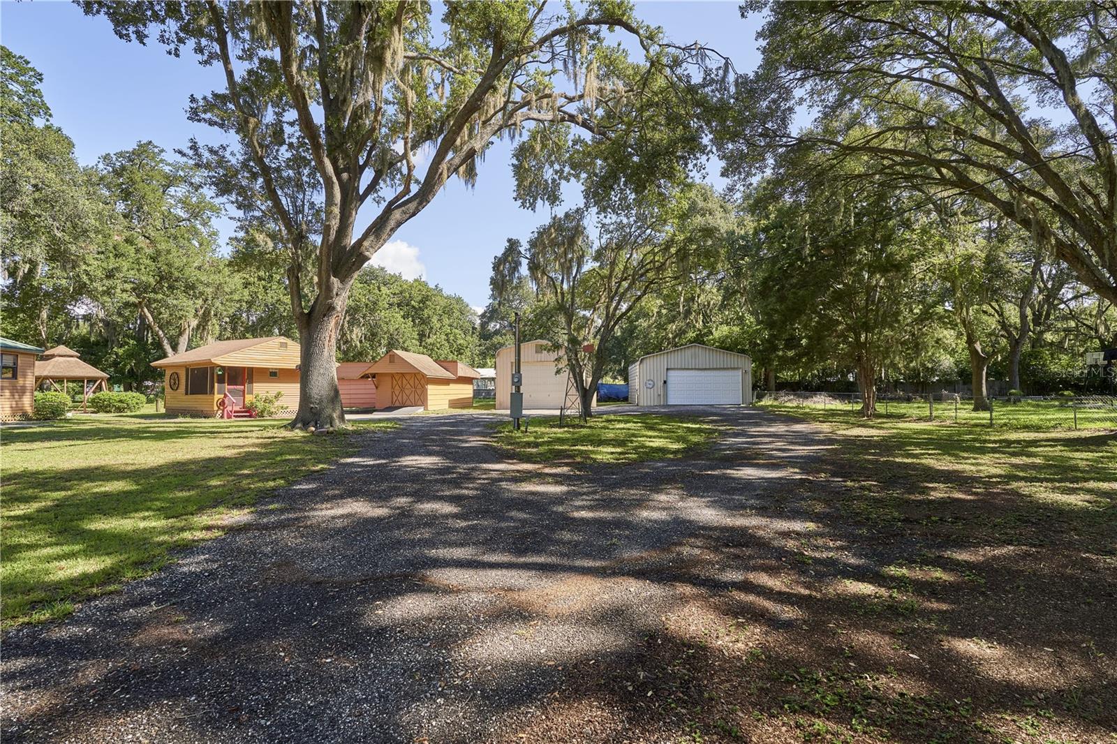 Quest Cottage and three additional garages and workshop