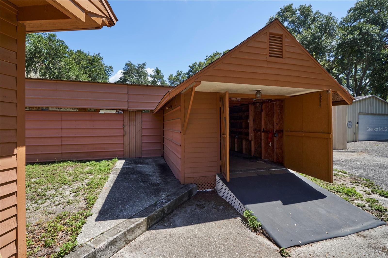 Motorcycle garage and attached sstorage
