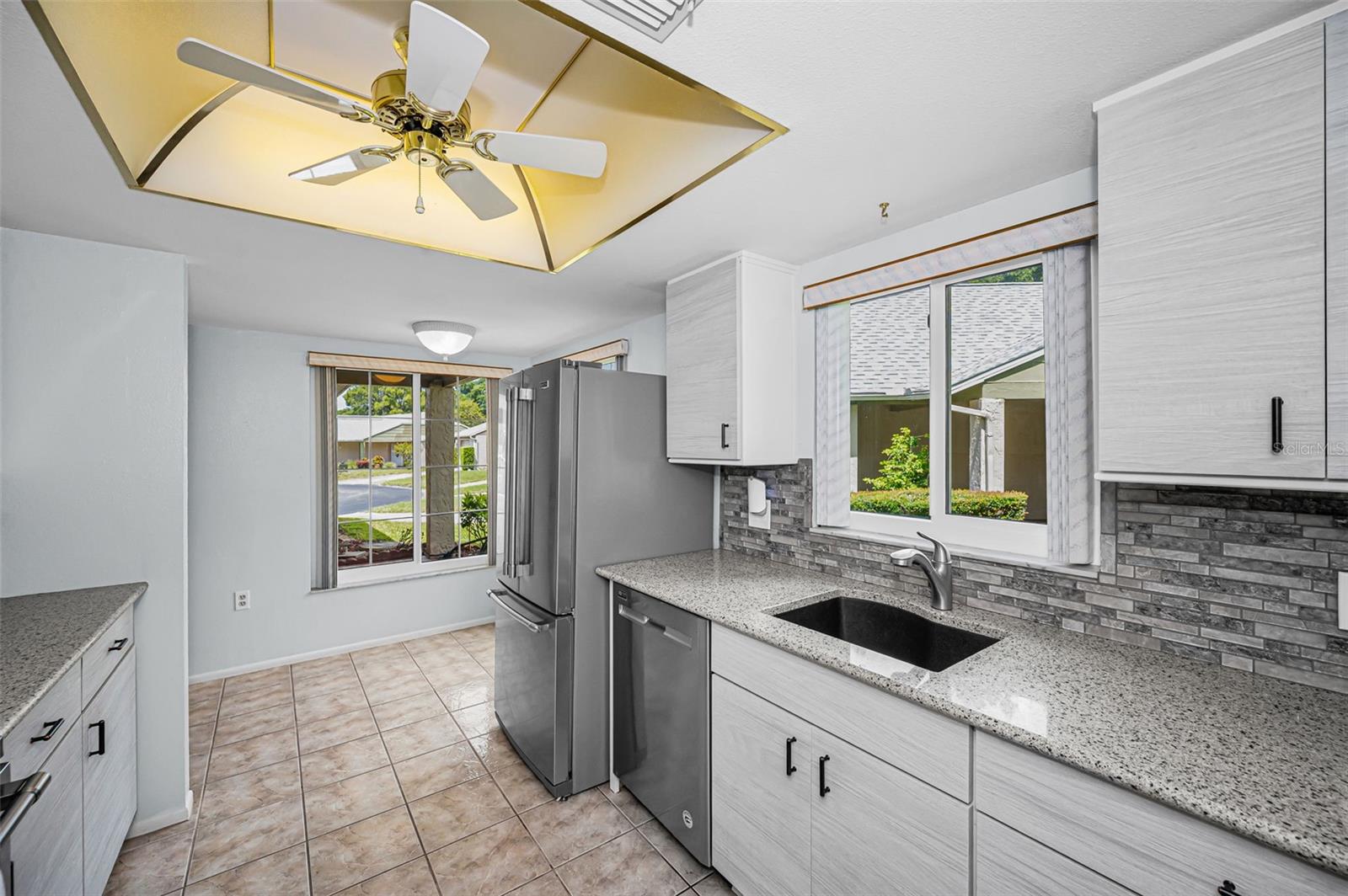 Remodeled Kitchen - Light & Bright - soft close-pullout cabinet features
