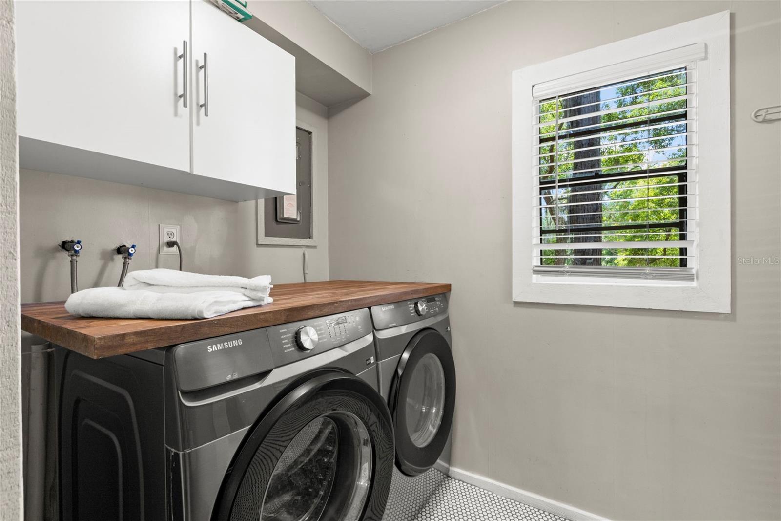 Laundry room off half bath