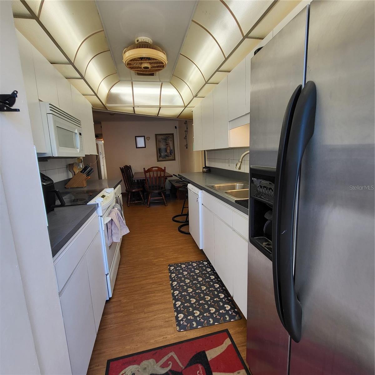 View into kitchen as you enter from side door.