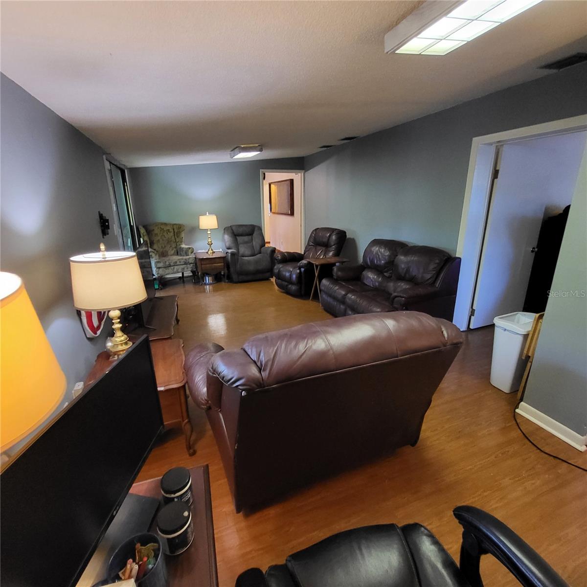 Family/Bonus Room has a pocket slider to the dining area and a door to 3rd bedroom.
