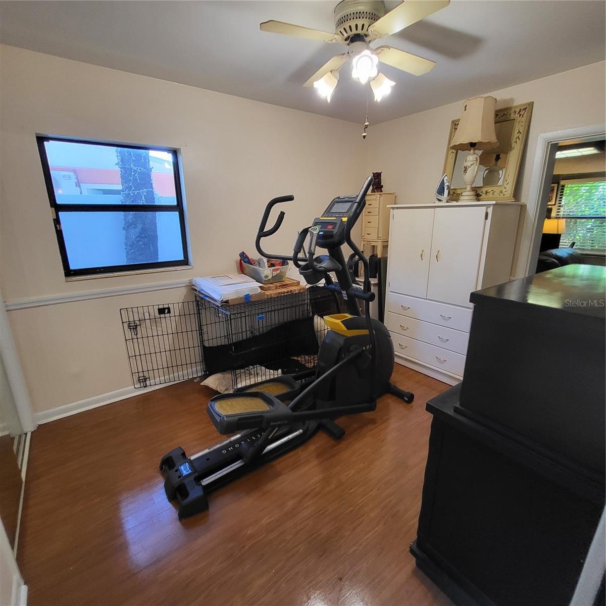 Bedroom three has 2 doors and is accessible from the main hallway as well as the back family/bonus room.
