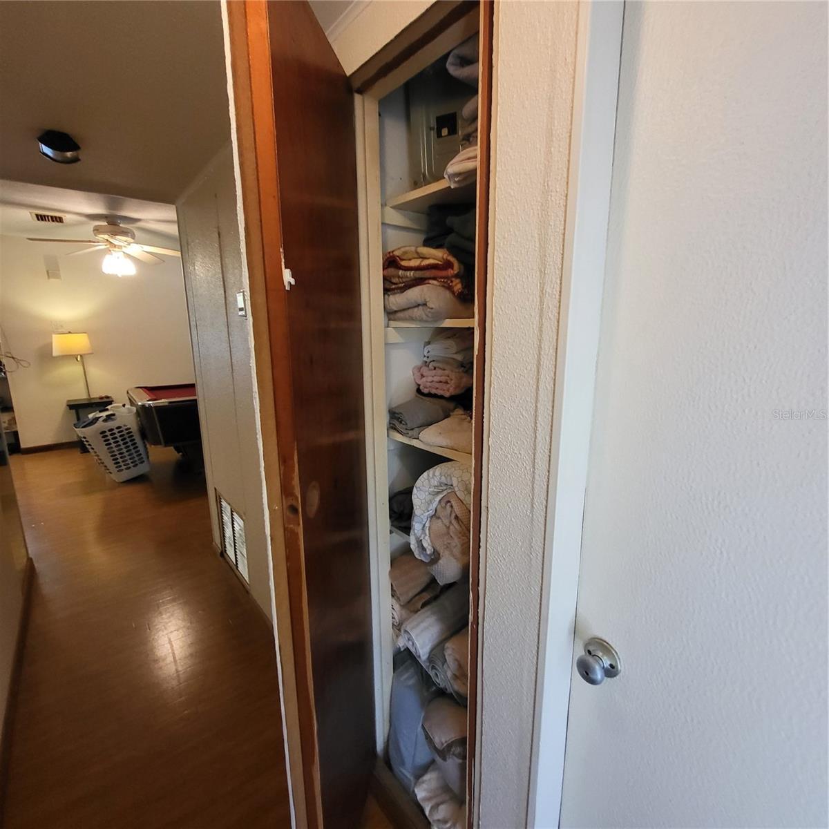 Hideaway built-in linen closet!