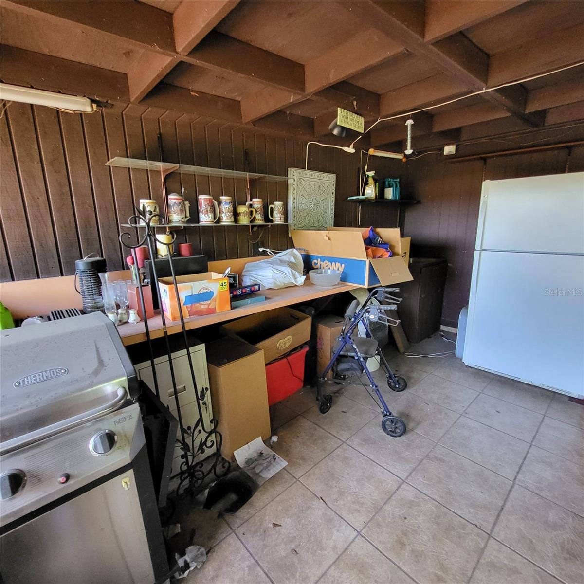 Make this area into a functional outdoor kitchen/bar or anything you can dream up!  Water & electric available.  Sink works, but Gen Aire does not.