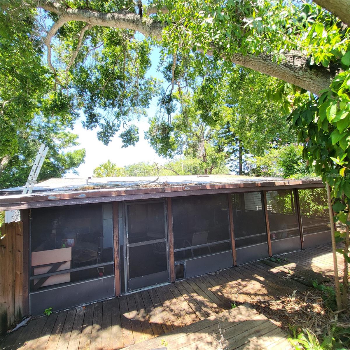 Large back patio nearly spans the width of the house!