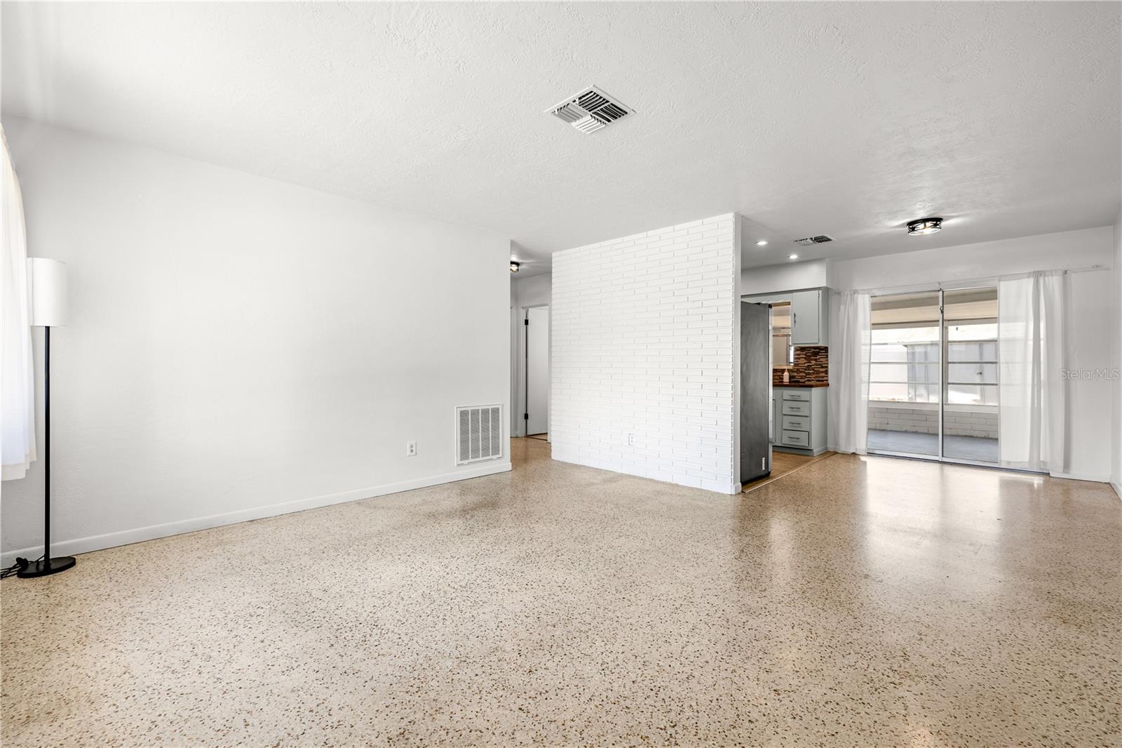 Living room leading to dining/kitchen