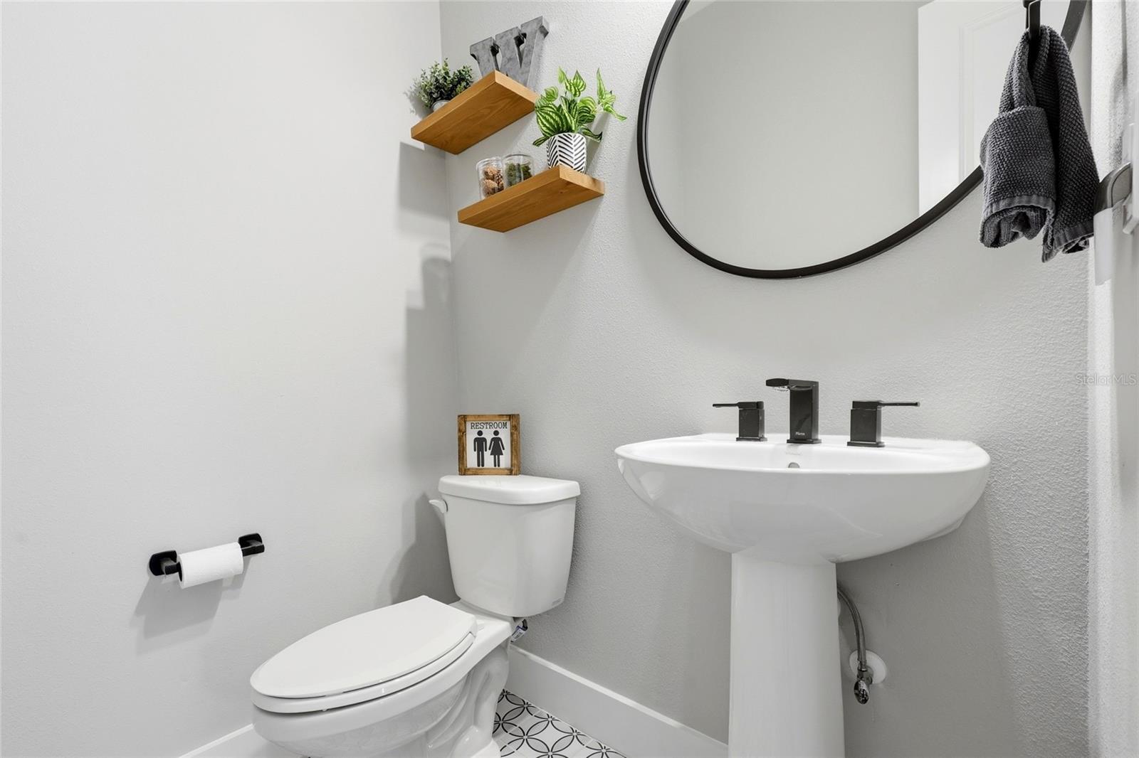 Half Bath Located Just off of Foyer