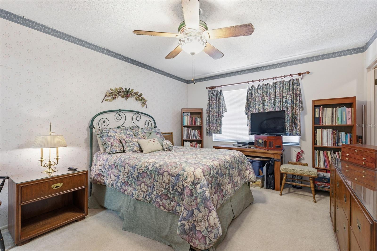 The master suite features an ensuite bathroom and walk in closet