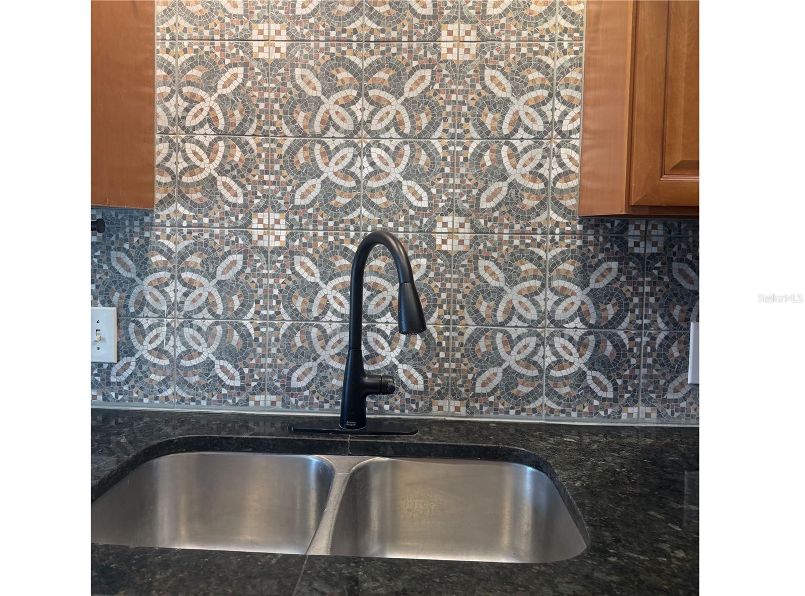 Deep dual-basin kitchen sinks