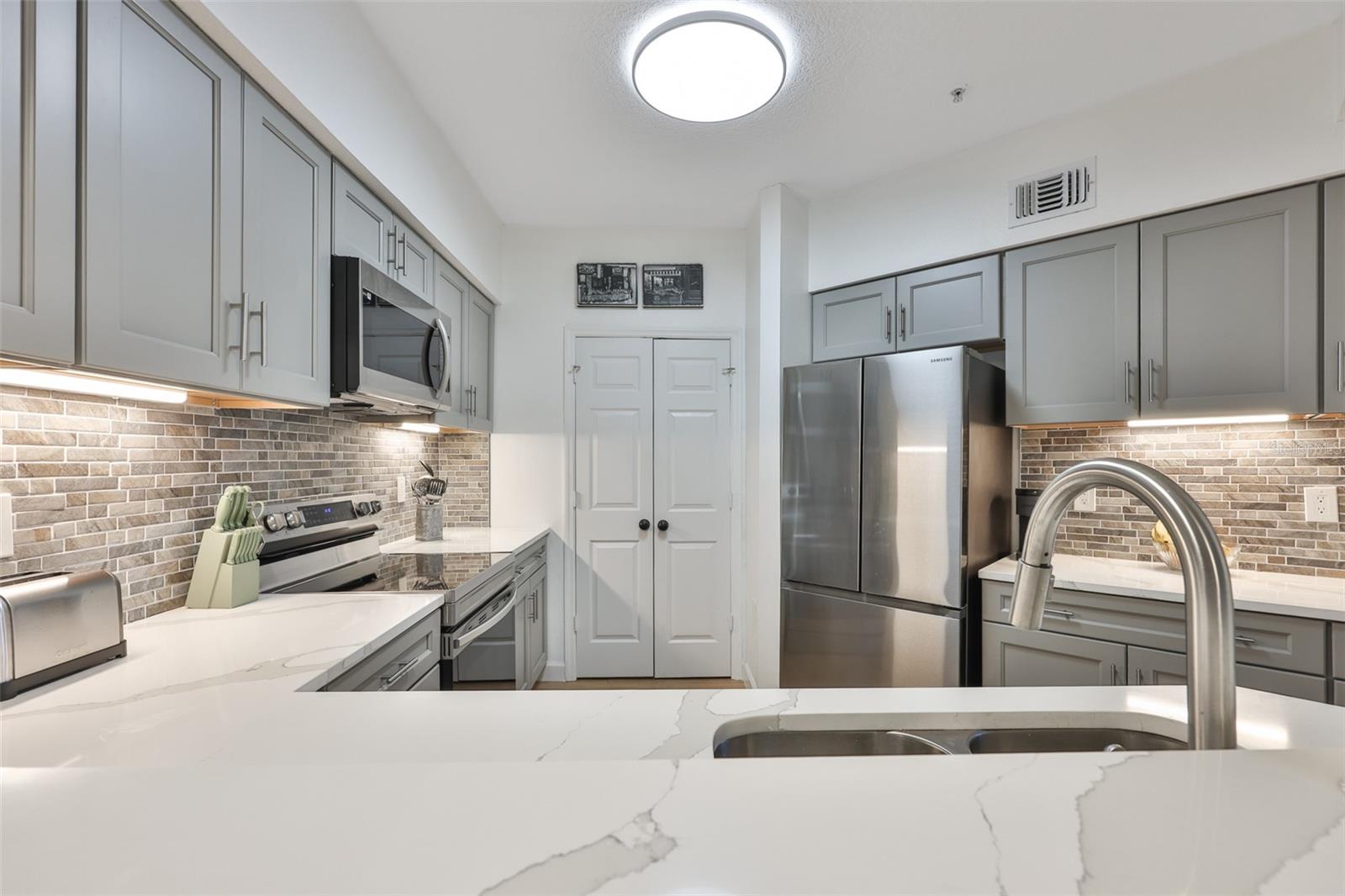 Kitchen with laundry room access