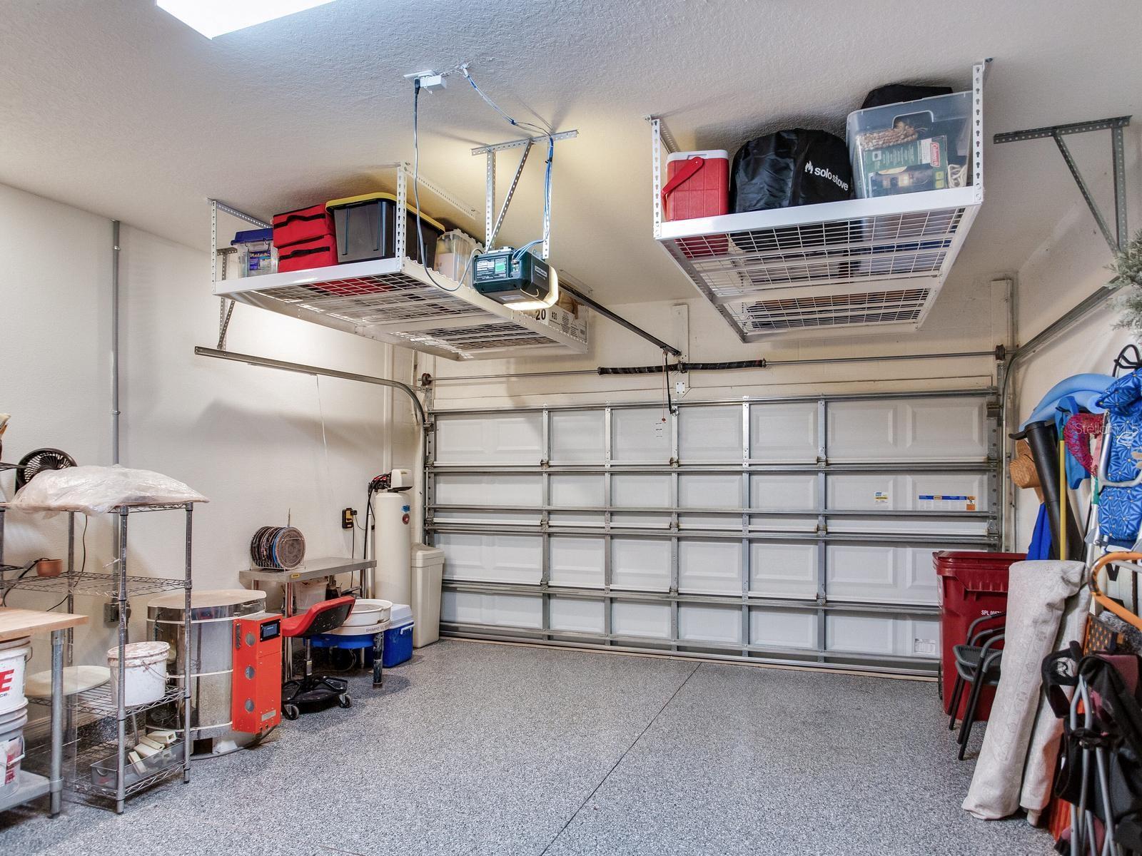 Two car garage with epoxy floor and extra storage