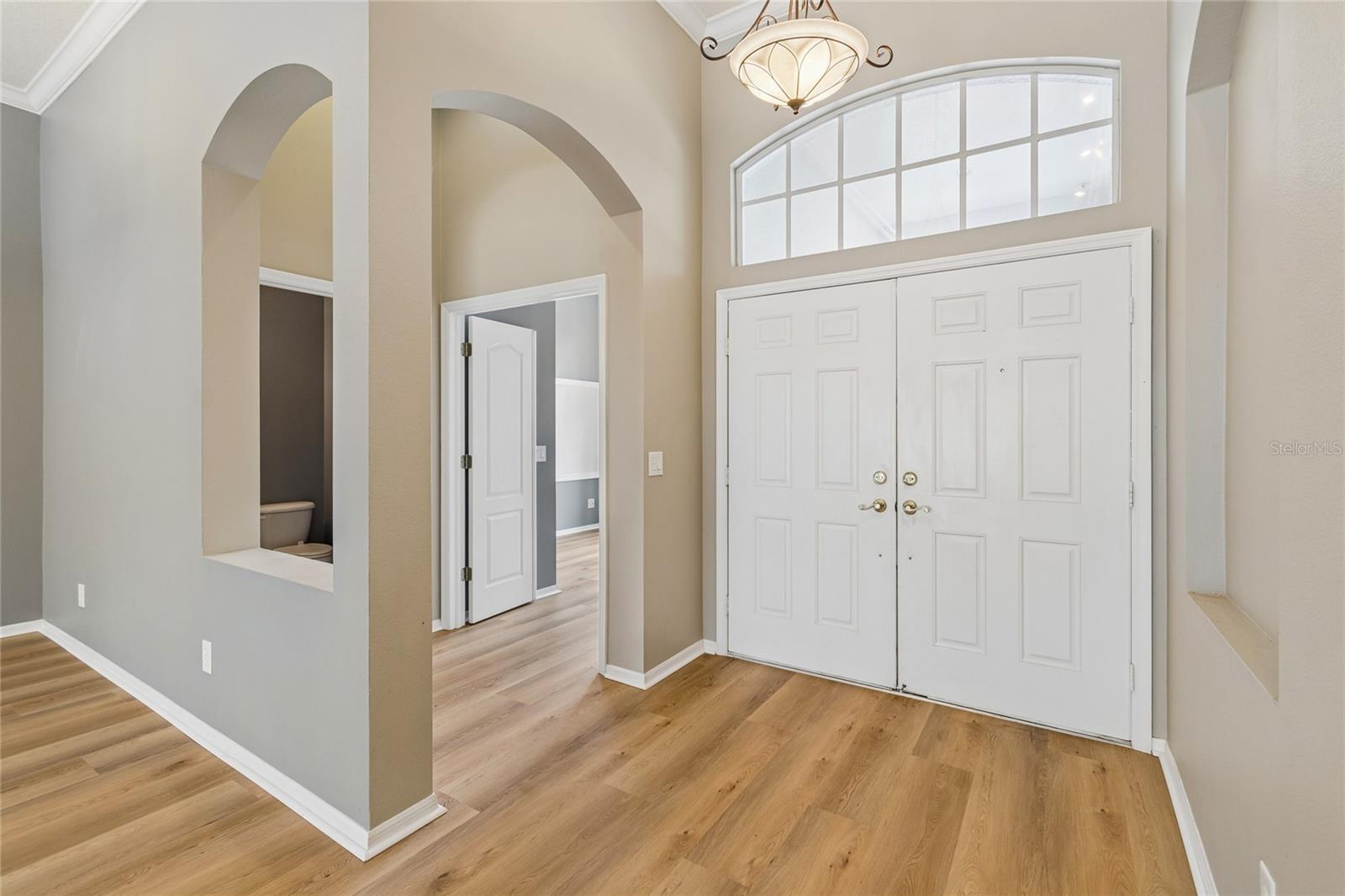 Half bath and office to the left of the front door