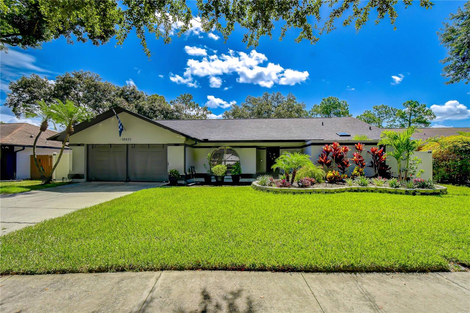 Beautifully updated single-story pool home overlooking the golf course in Northdale.
