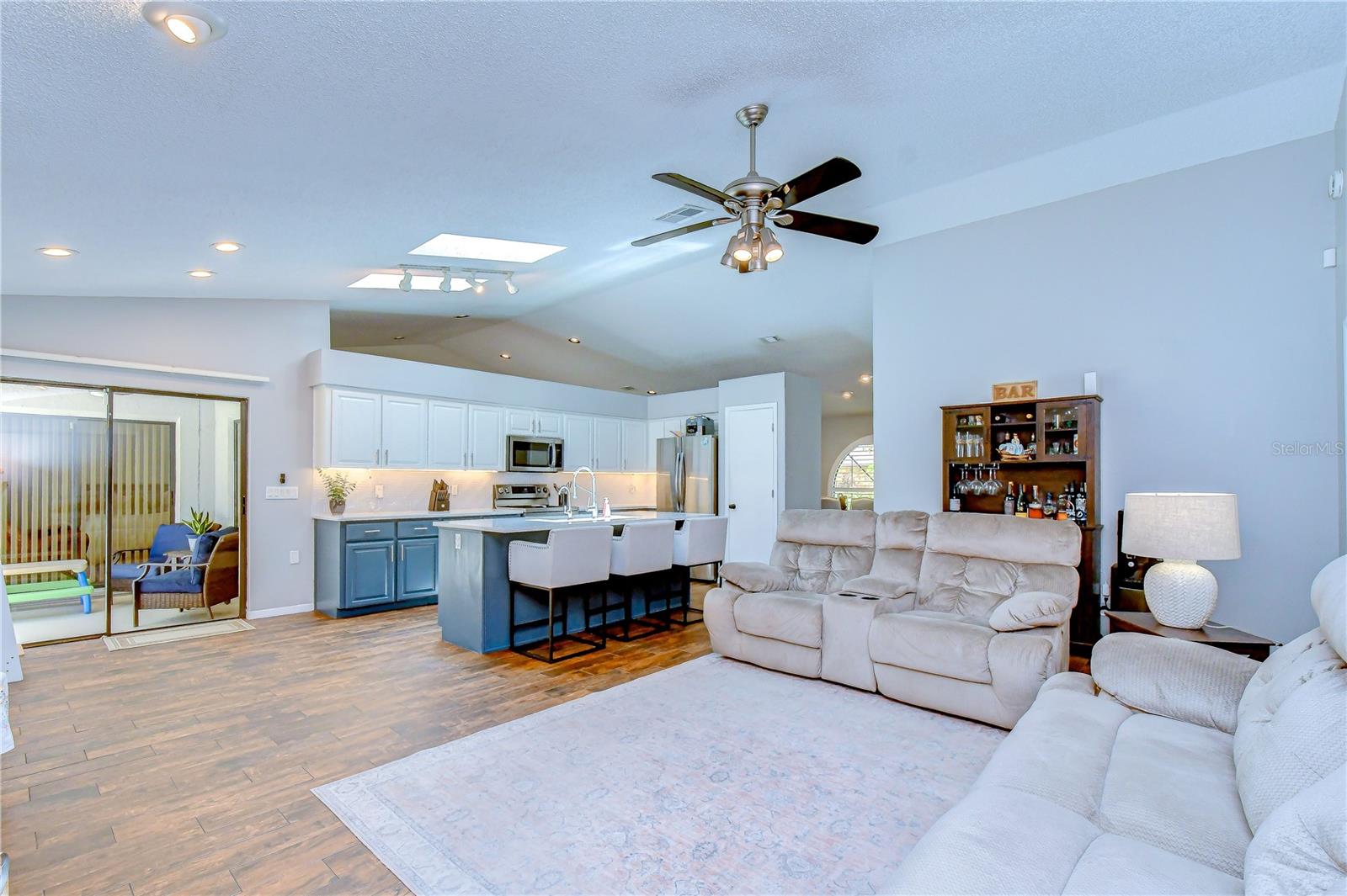 Open layout connecting kitchen and living spaces.