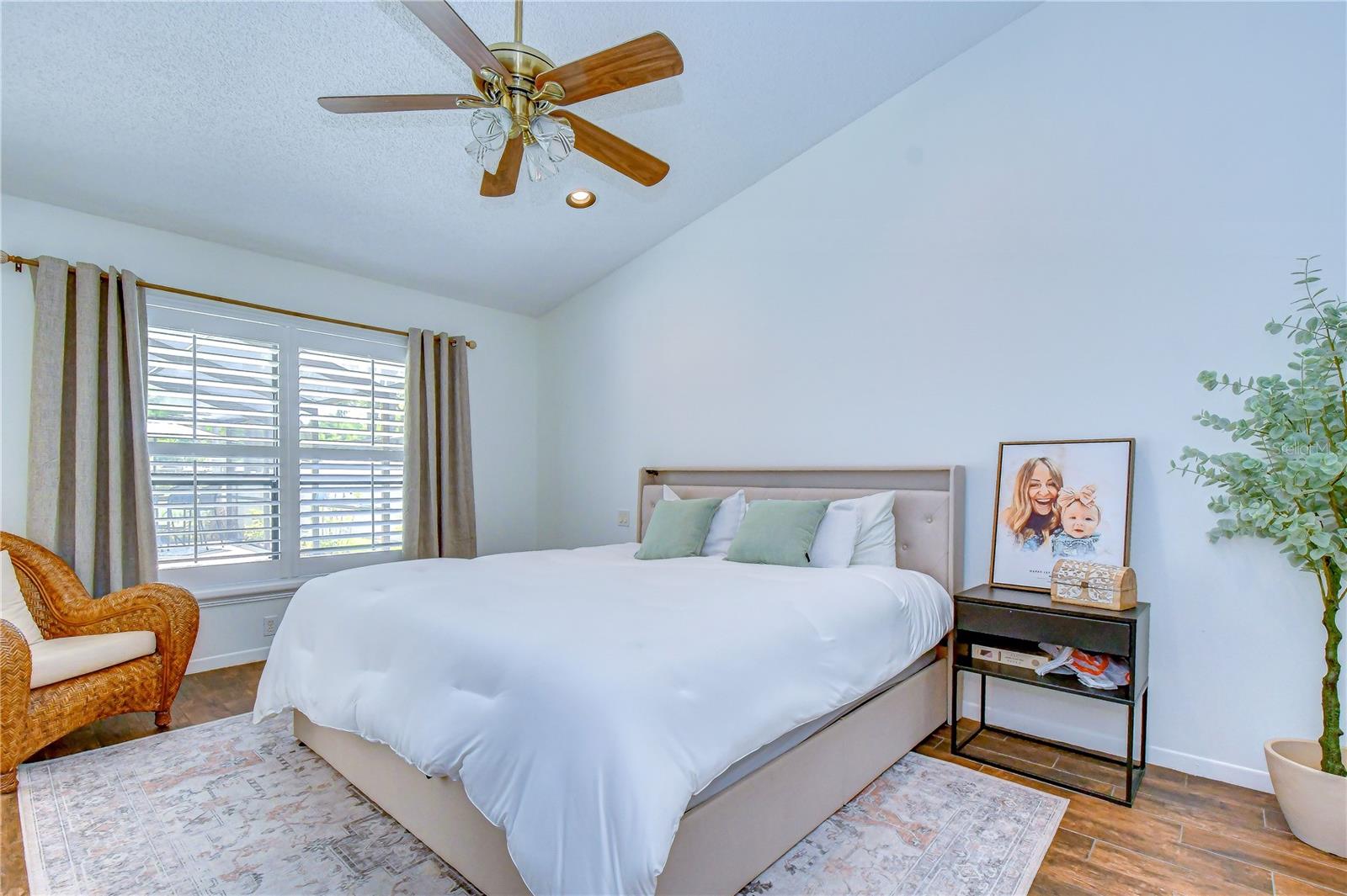 Spacious owner's retreat with direct lanai and pool access.