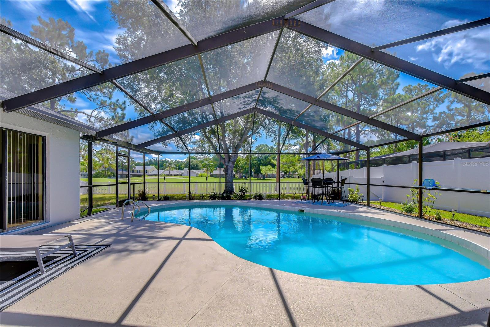 Sparkling private pool overlooking the golf course.