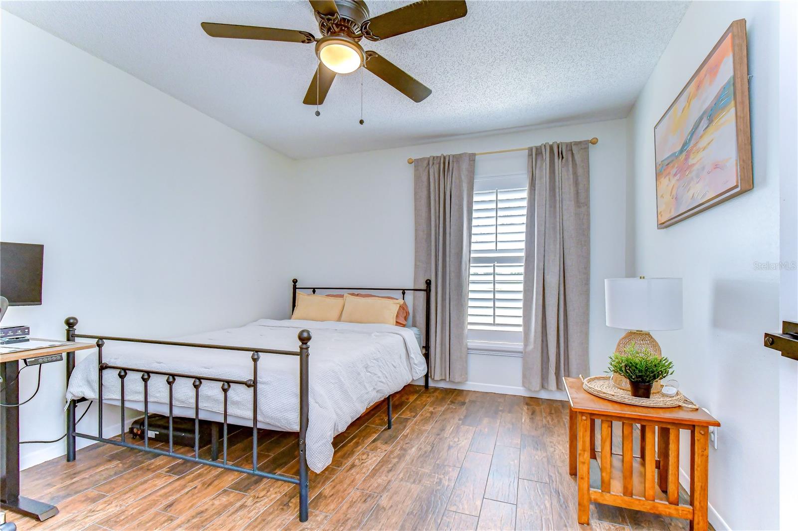 Spacious secondary bedroom ideal for family or guests.