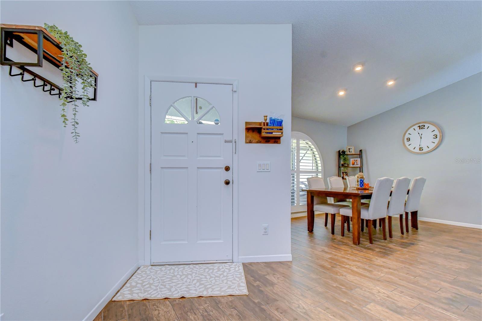 Welcoming entry leading into bright open living spaces.