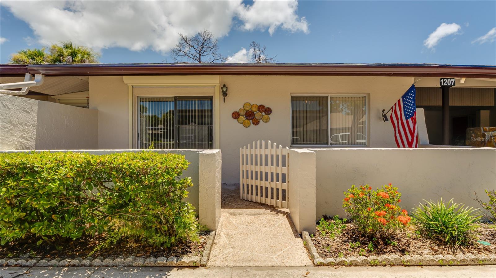 SLIDING GLASS DOORS OFF THE MASTER BEDROOM WITH HURRICANE SHUTTER