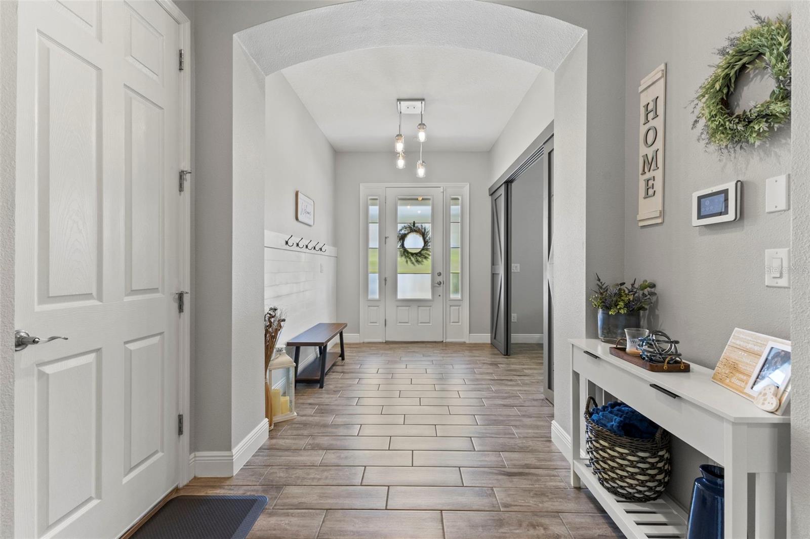 Foyer with high ceilings throughout
