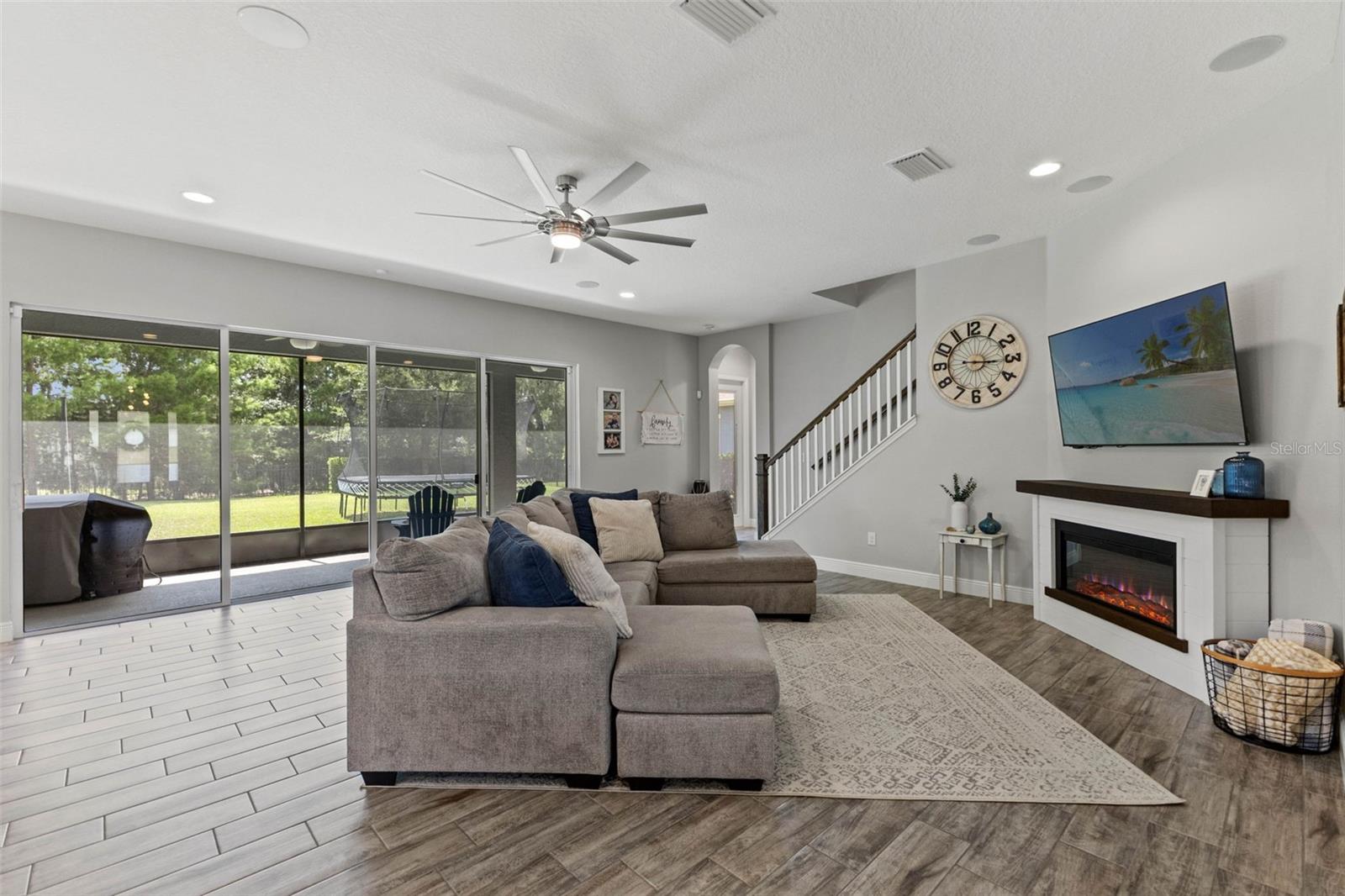 Great Room with Natural Light pouring in those 4 Sliders