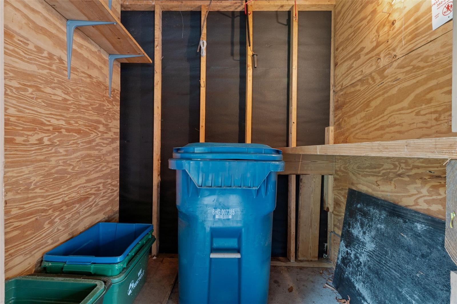 Storage area in the carport