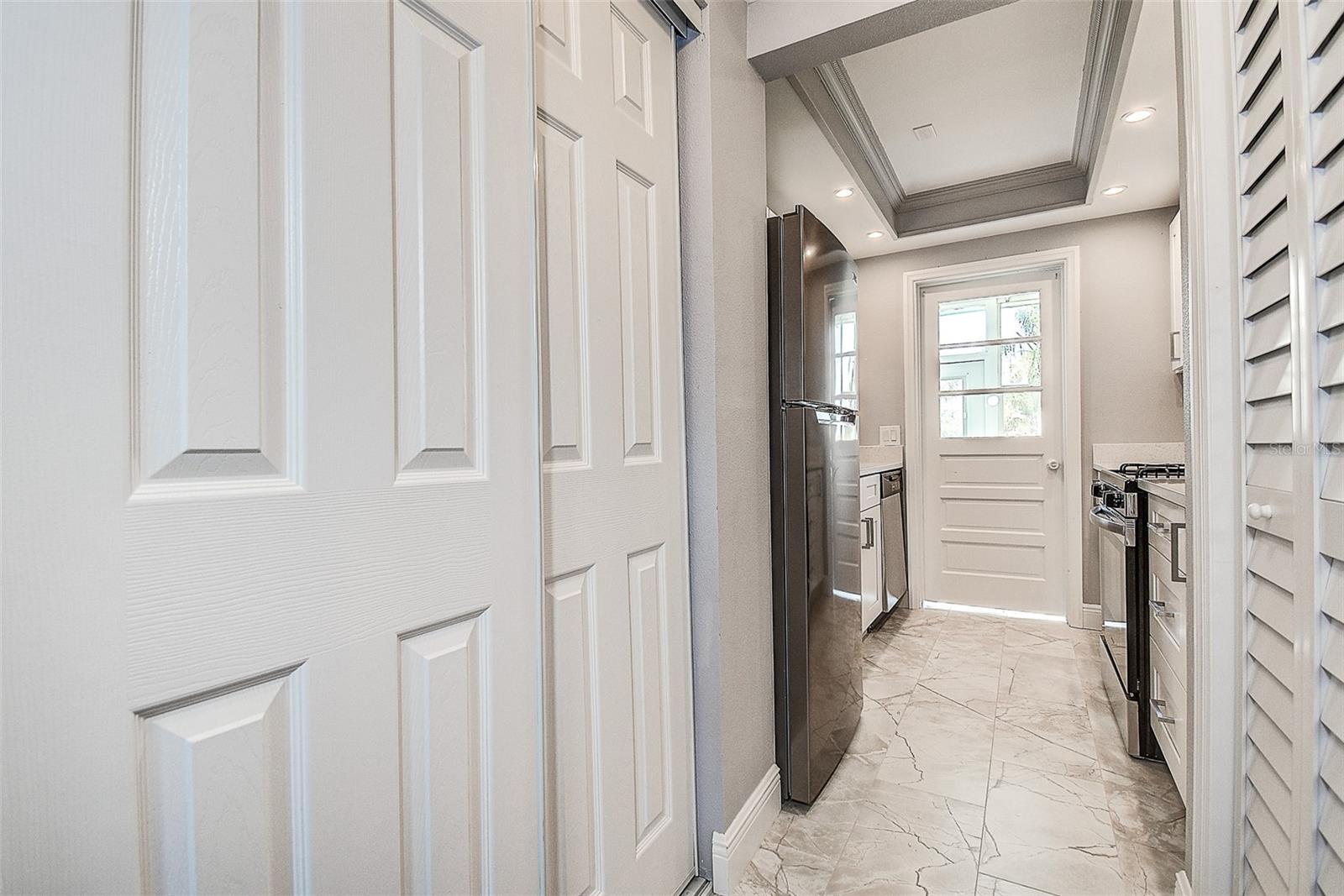 Kitchen Entry w/ Pantry/Storage Closets