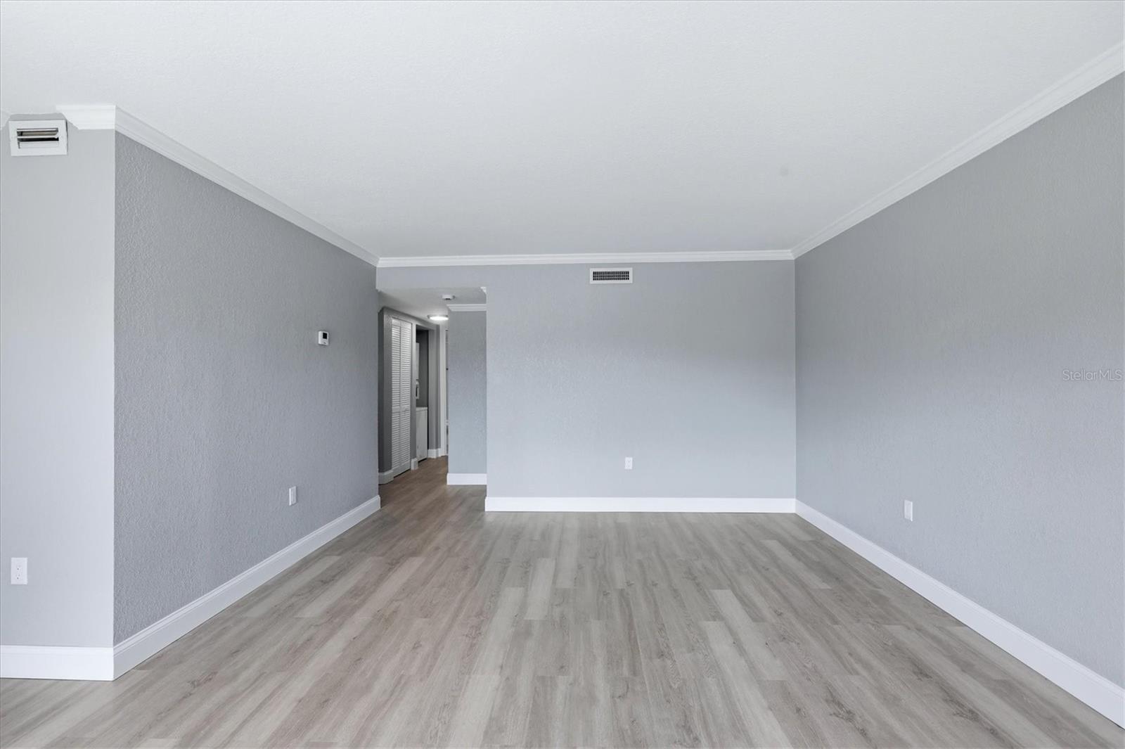 Living/Dining room hallway to bath and bedroom