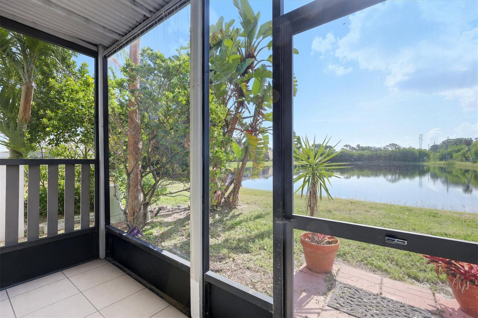 Screened in lanai with pond view