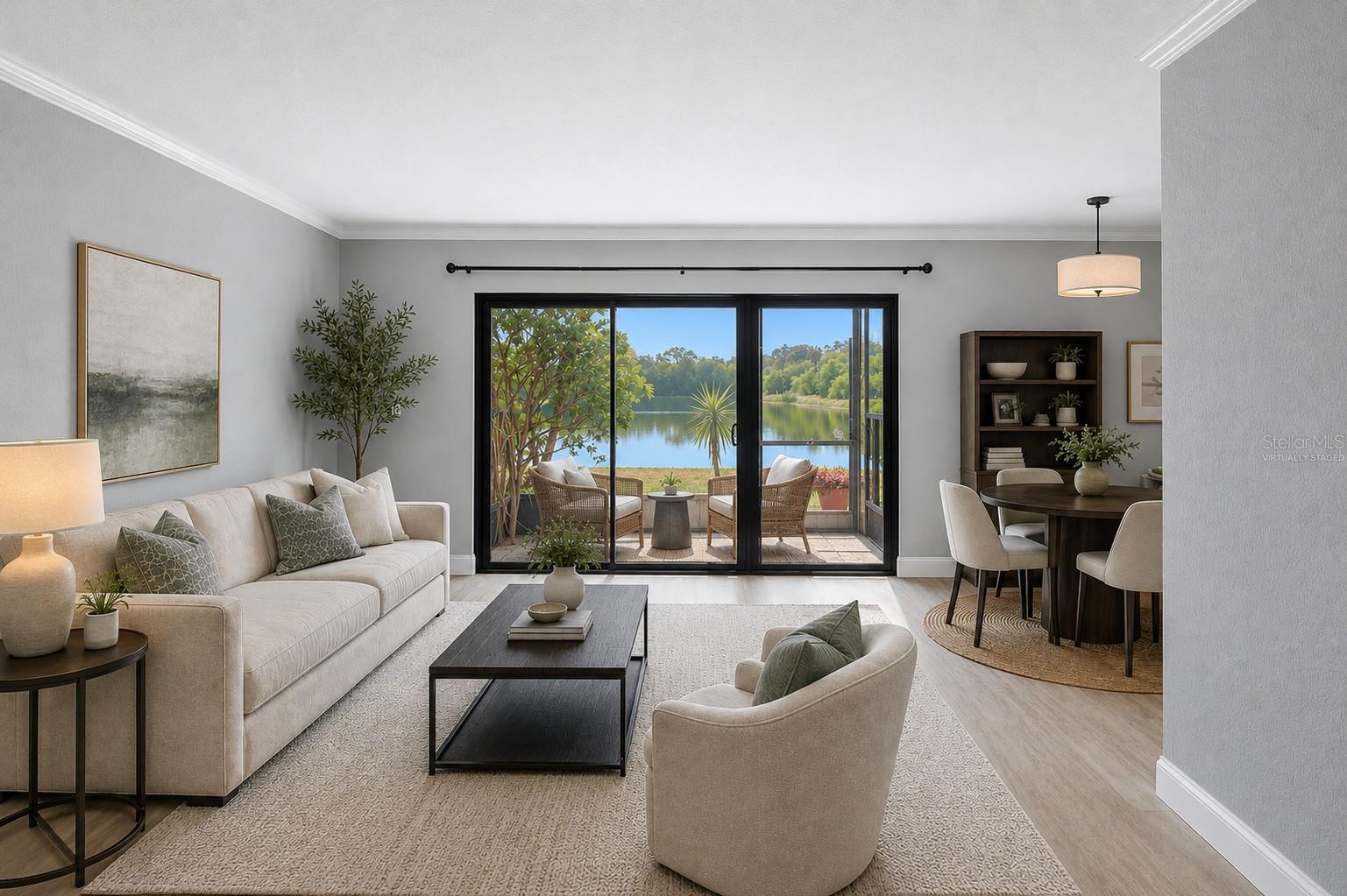 Virtually Staged living /dining area overlooking pond views