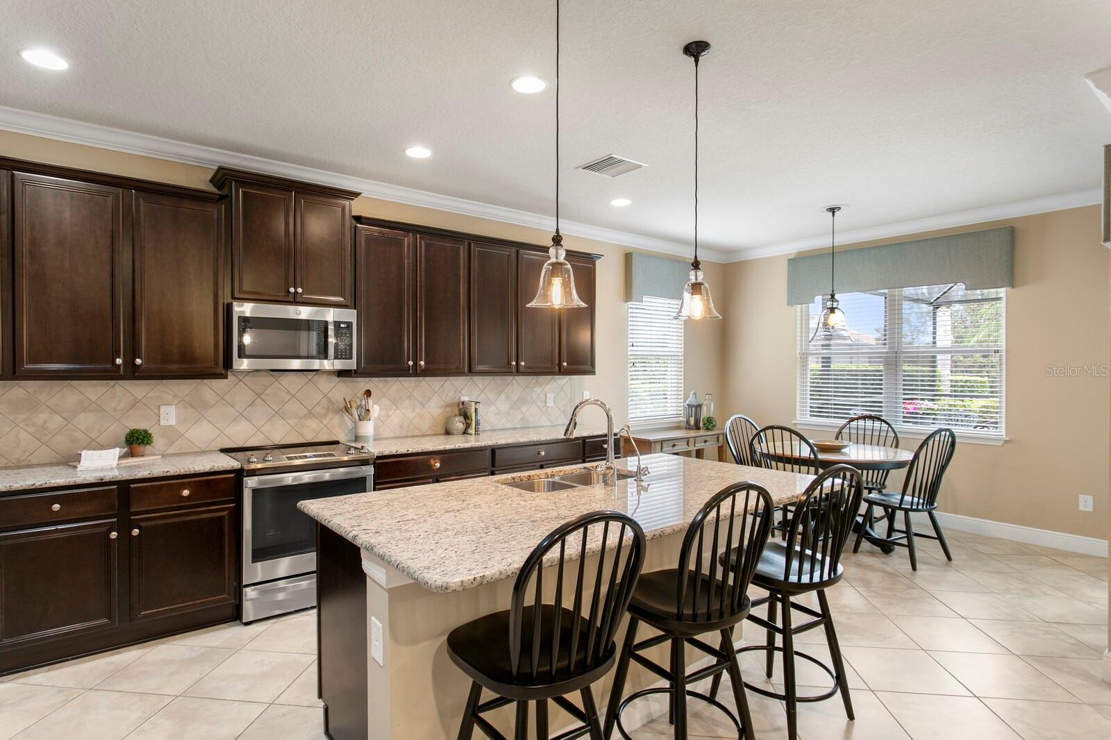 Large kitchen island with breakfast bar