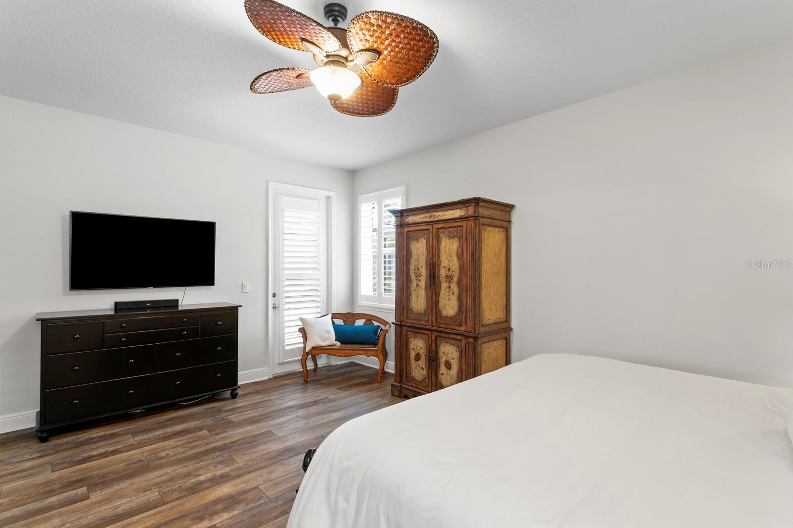 1st floor primary suite with direct pool access