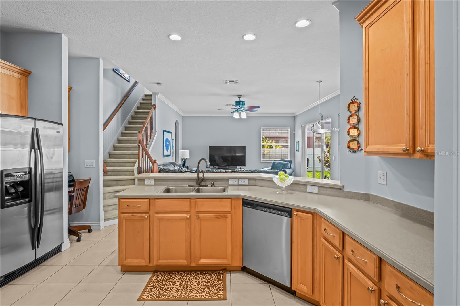 Kitchen overlooks Family Rm