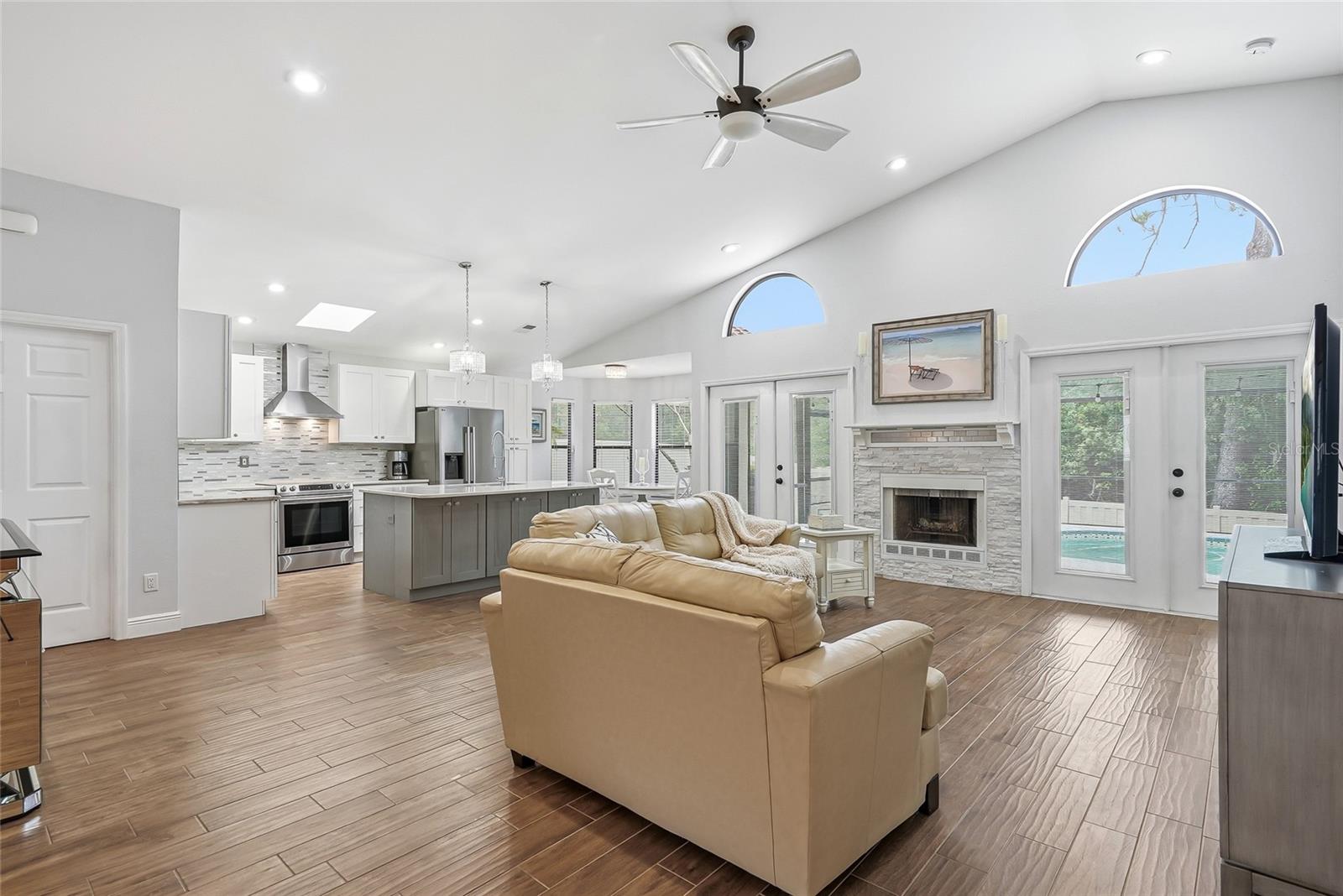 Wood plank tile is featured throughout this entire home providing modern and seamless flow.
