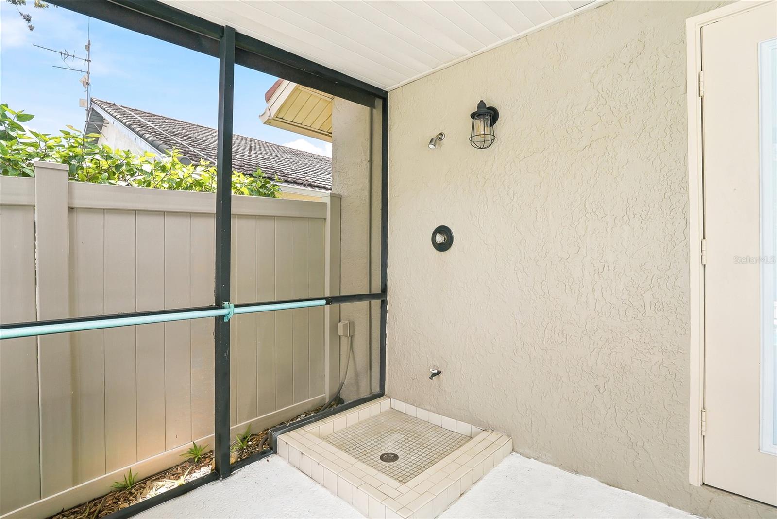 Outdoor shower for a quick rinse before a swim.