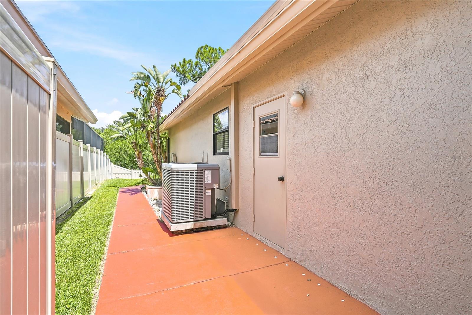 Newer vinyl fence.