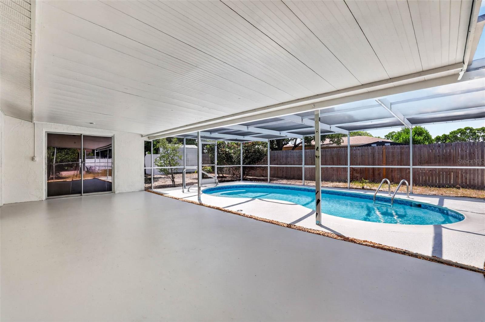 Pool/Rear Covered Screened in Patio