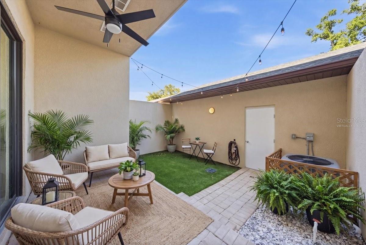 Virtually Staged back patio furniture/landscape