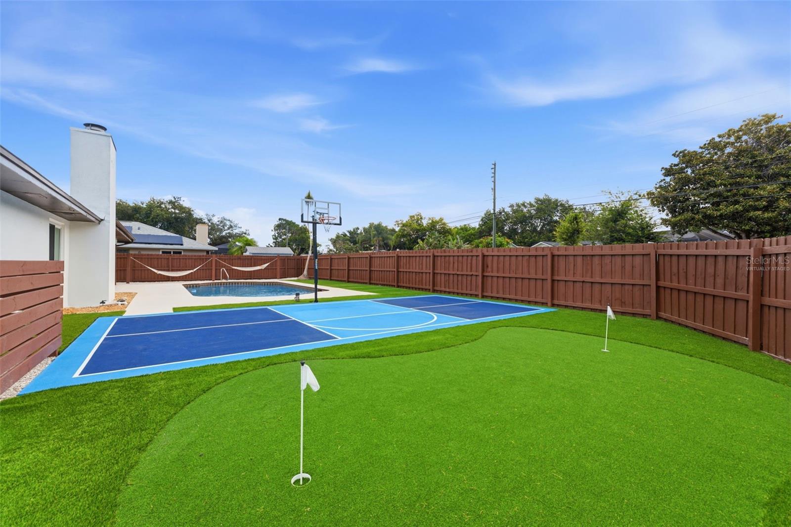 virtually staged photo of games and side yard