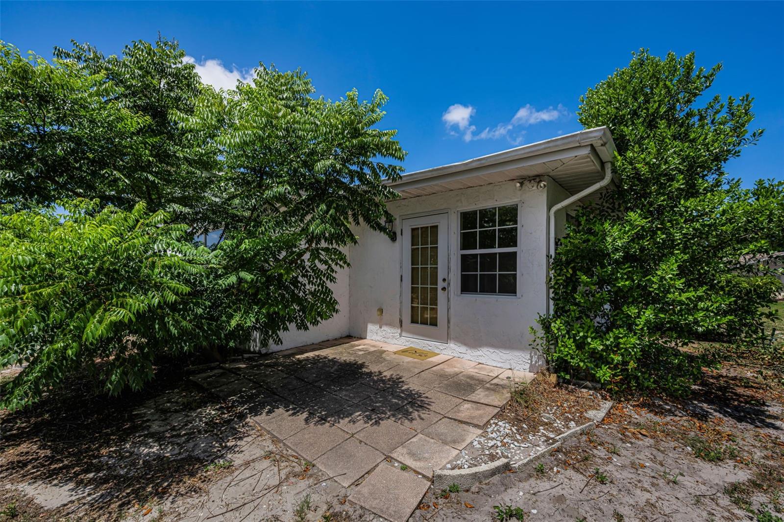 Patio for your enjoyment overlooking a beautiful private yard