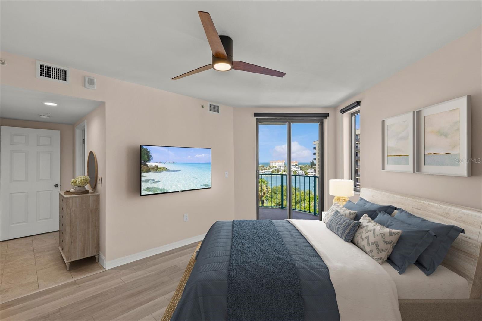 Primary Suite with private Balcony and View! Staged