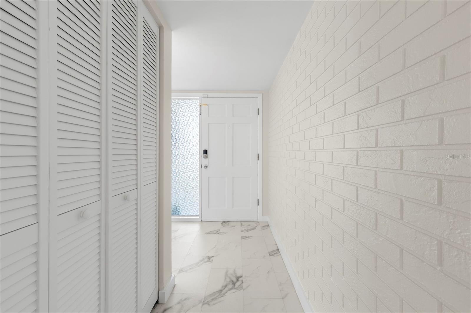 Foyer w/Brick accent