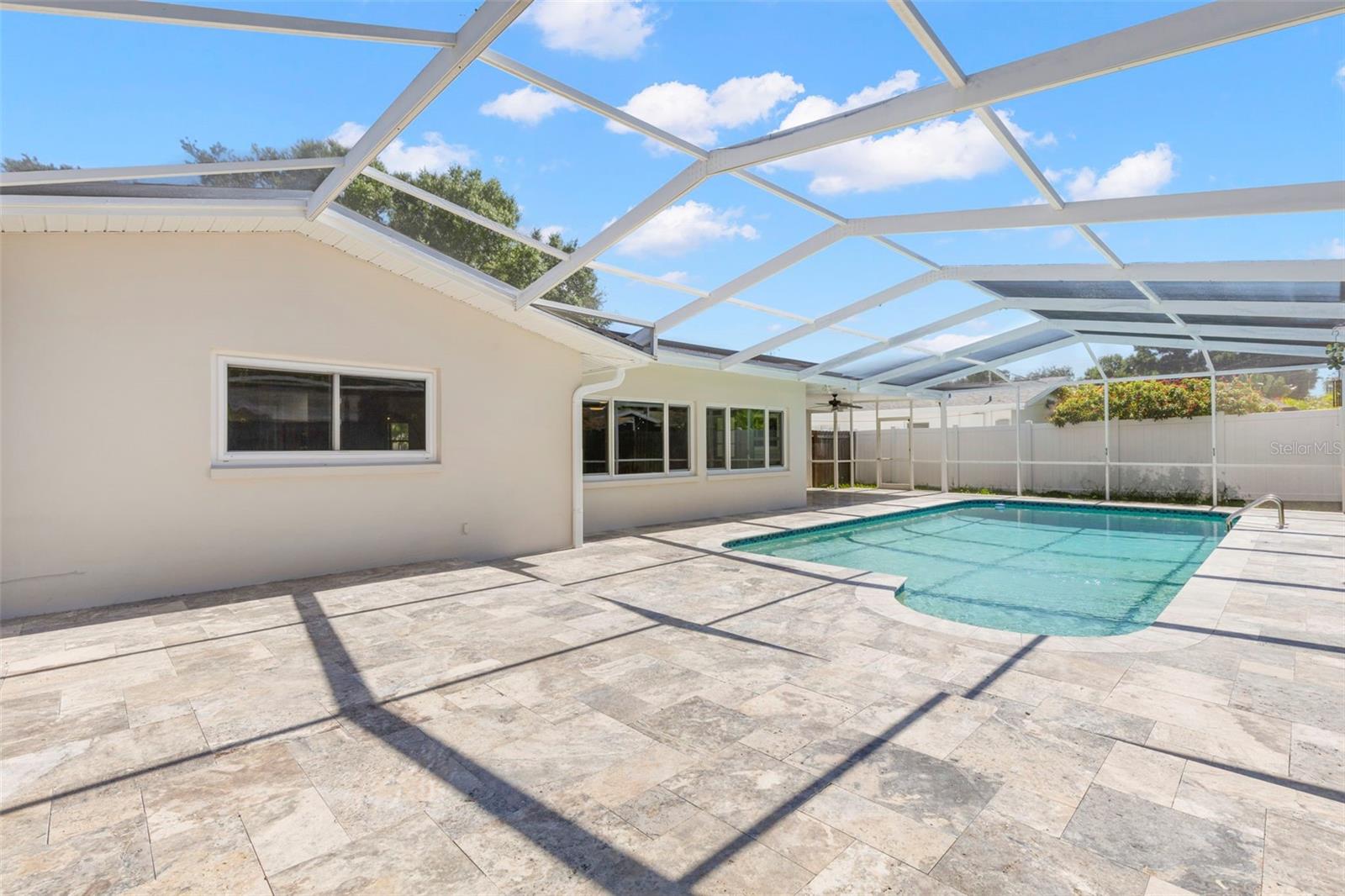 Extended Travertiie Pool patio
